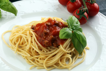 Plate of delicious spaghetti Bolognaise or Bolognese with savory