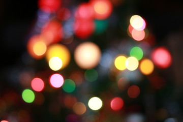 Fototapeta premium Colorfull background with christmas lights in boken.