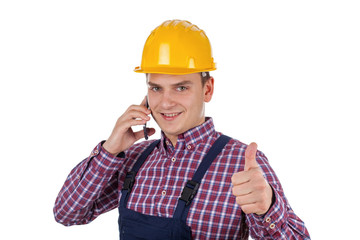 Young constructor on the phone