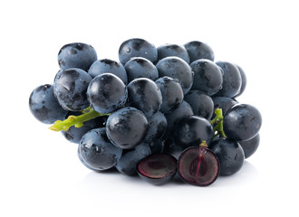 Black seedless grapes isolated on white background
