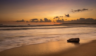 An  orange glow sunrise over the south China sea off the coast of Vietnam.