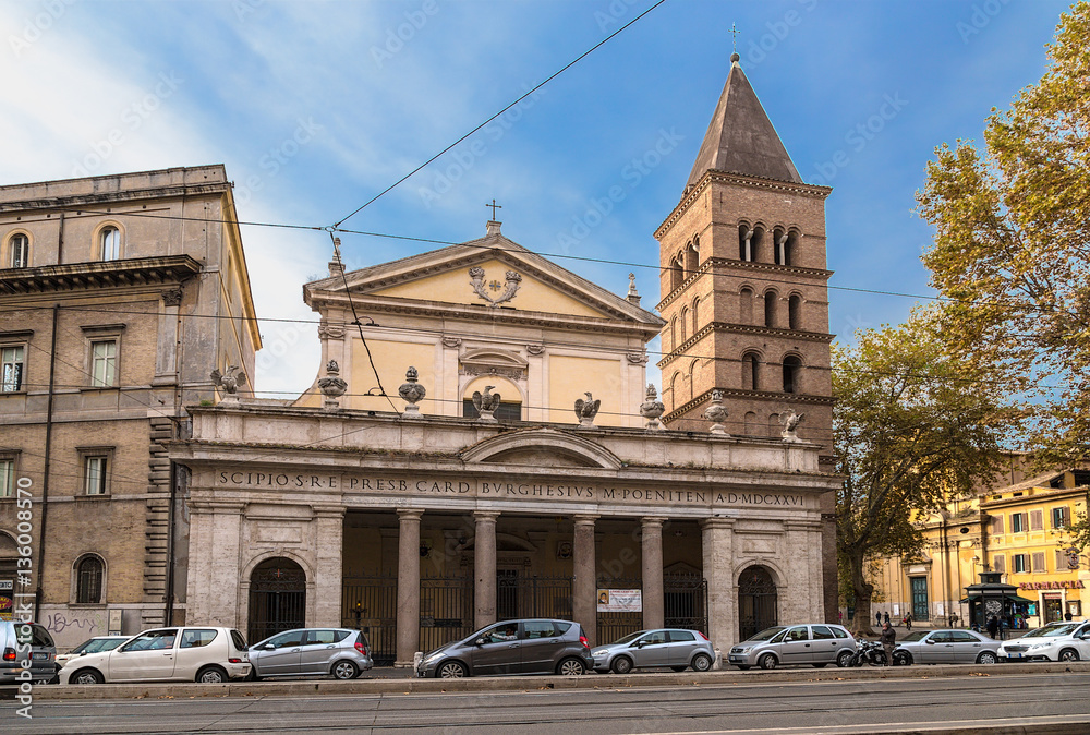 Wall mural rome. italy. basilica of st. chrysogonus (basilica di san crisogono, iv century) with a bell tower o