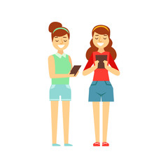 Two Girls Tooking At Their Tablets Standing, Person Being Online All The Time Obsessed With Gadget