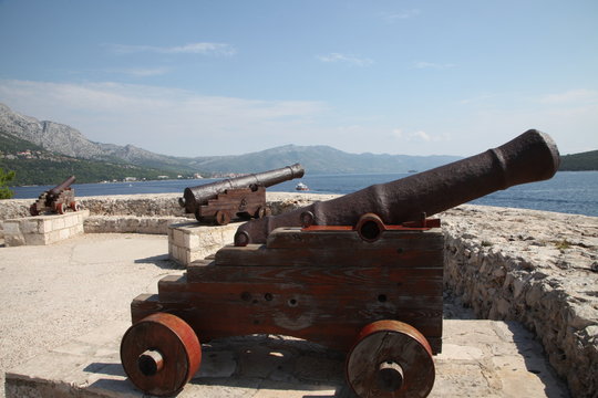 Croatia, Korcula, ancient cannon. 