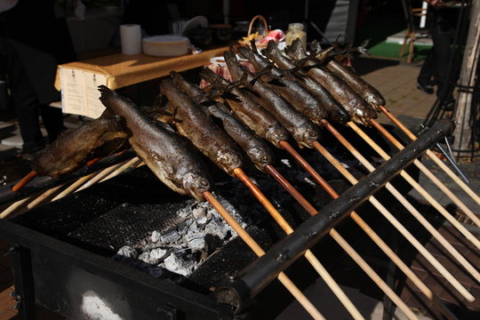  Grilling fish, fried fish. Street,  Lithuania