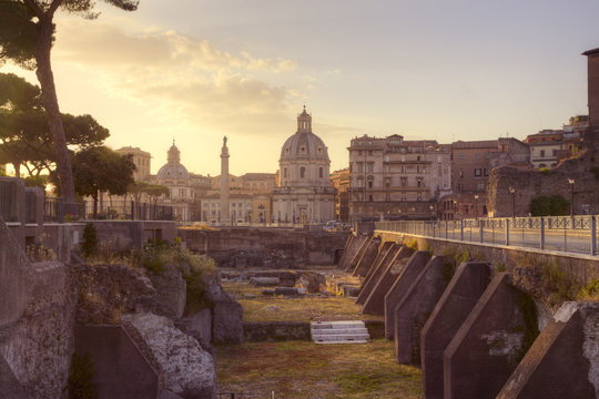 Santa Maria di Loreto and ruins of roman forum in Rome, Italy.