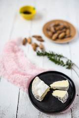 Obraz na płótnie Canvas Camembert cheese with breadsticks and marmalade