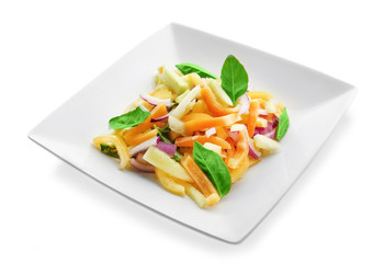 Tasty vegetable salad in plate on white background