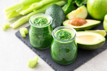 Blended green smoothie with ingredients. Superfood, detox 