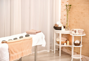 Interior of massage room in modern wellness center