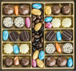 Colorful chocolates in box