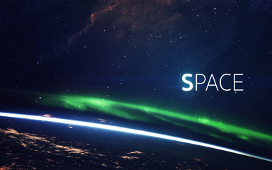 Obraz premium Natural phenomenon of Northern Lights (Aurora Borealis) related to the earth's magnetic field. Elements of this image furnished by NASA