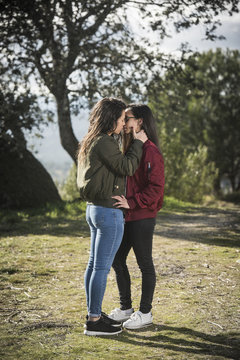 Young ladies kissing