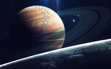 Gas giant planet. Beauty of deep space. Billions of galaxies in the universe. Elements of this image furnished by NASA © Vadimsadovski