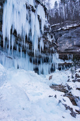 Scenic frozen waterfall in Slovenia