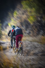 Two men riding bikes on a mountain road in Balcova - Izmir (Turkey)