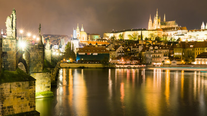 Night cityscape of Prague near Charles Bridge, Capital of Czechia.