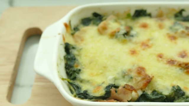 Spinach lasagna in white plate
