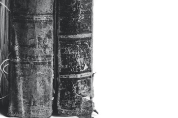 Closeup of few ancient antiquarian vintage books with leather binding more then 100 years old on a...