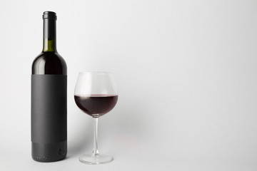 Front view of the wine bottle and wine glass