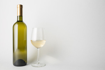 Front view of the wine bottle and wine glass