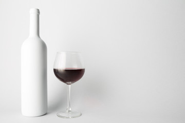 Front view of the wine bottle and wine glass