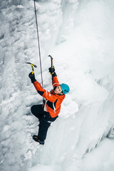 women climbed a frozen waterfall, icicle
