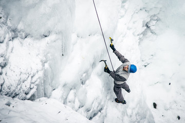 men climbed a frozen waterfall, icicle