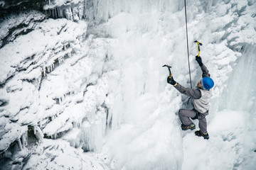 men climbed a frozen waterfall, icicle