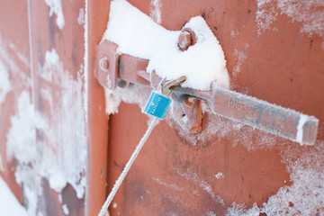 Cable seal on the metal container. Locking device