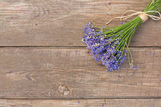 Bouquet of lavender on vintage wood background
