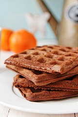 Chocolate waffes with strawberries