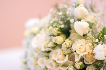 The bride's bouquet, white roses, tulips, delicate flowers, use as background or texture, soft pastel colors