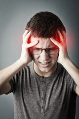 Frustrated teen with a headache
