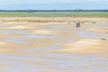 Truck driving through the Dunes in the Lagoa do Peixe lake