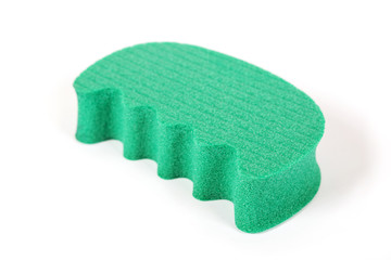 Сarpal expander of green color is isolated on a white background