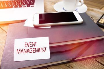 Card saying Event Management on note pad