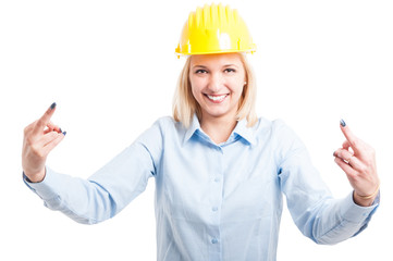 Female engineer showing obscene gesture with both hands