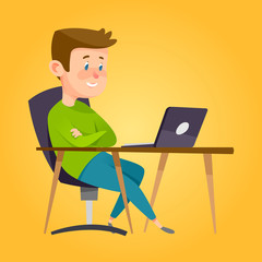 boy studying in a classroom with notebook.