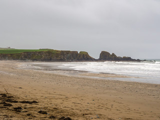 Cloudy overcast late summers day at Bunmahon, Knockmahon beach, waterford, Republic of Ireland