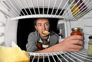 man near the refrigerator