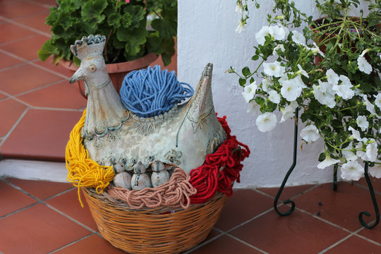 Ceramic chicken. Street decoration. Italy, Sardinia, Villasimius