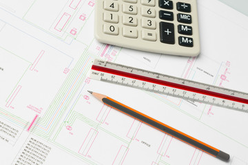 wiring diagram and calculator on the table