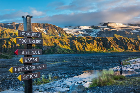 Fototapeta Signpost in Thorsmork and riverbed of Krossa, Iceland