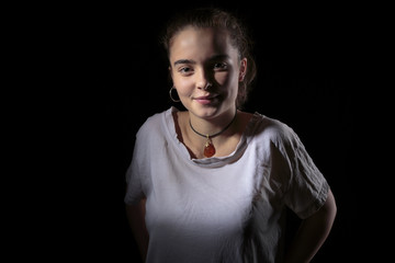portrait of a beautiful woman with black background
