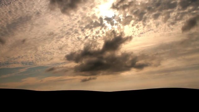 Time Lapse of Dramatic Cloudy Sky & Rays of Sun Light over Rolling Hills of Dartmoor National Park, Devon UK