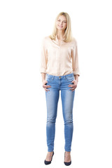 Female portrait. Full length shot of a confident mature woman standing against at white background.