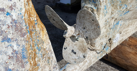 Old rusty fishing boat propeller