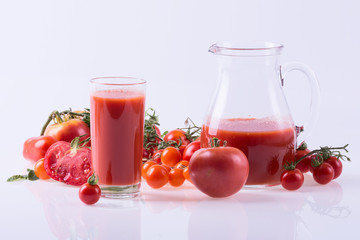 Ripe tomatoes and juice