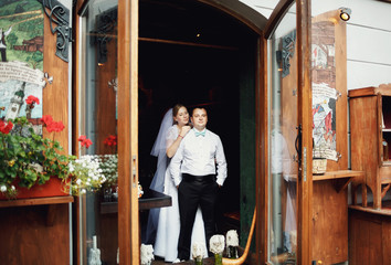 The brides embracing in restaurant